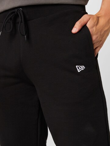 NEW ERA Tapered Trousers in Black