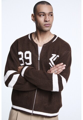 Vestes en maille Karl Kani en marron