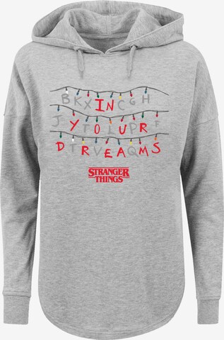 F4NT4STIC Sweatshirt 'Stranger Things In Your Dreams Netflix TV Series' in Grijs: voorkant