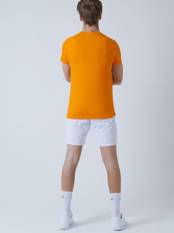 SPORTKIND - Camiseta funcional 'Crew Neck' en naranja