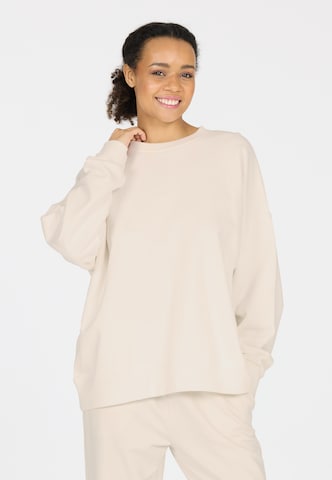 Athlecia Sports sweatshirt in Beige: front