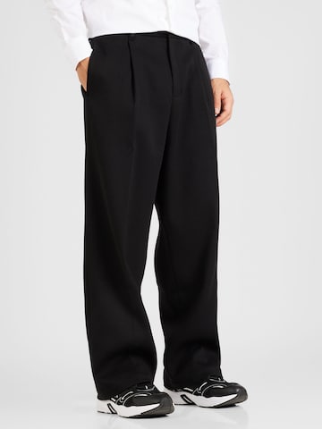Wide leg Pantaloni con pieghe di Calvin Klein in nero: frontale