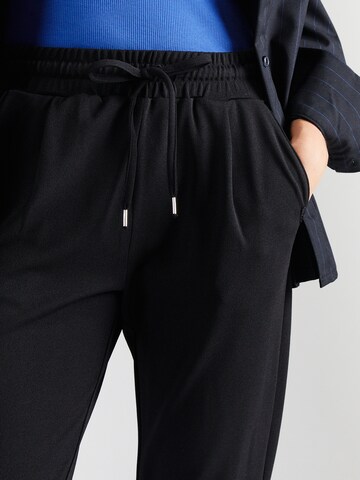 QS - Tapered Pantalón plisado en negro