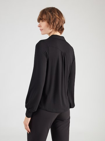 King Louie Blus 'Carina' i svart