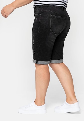 SHEEGO Slimfit Jeans in Zwart