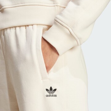 ADIDAS ORIGINALS Tapered Housut 'Essentials' värissä beige