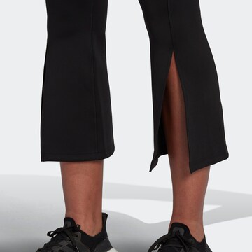 ADIDAS SPORTSWEAR Rozkloszowany krój Spodnie sportowe w kolorze czarny
