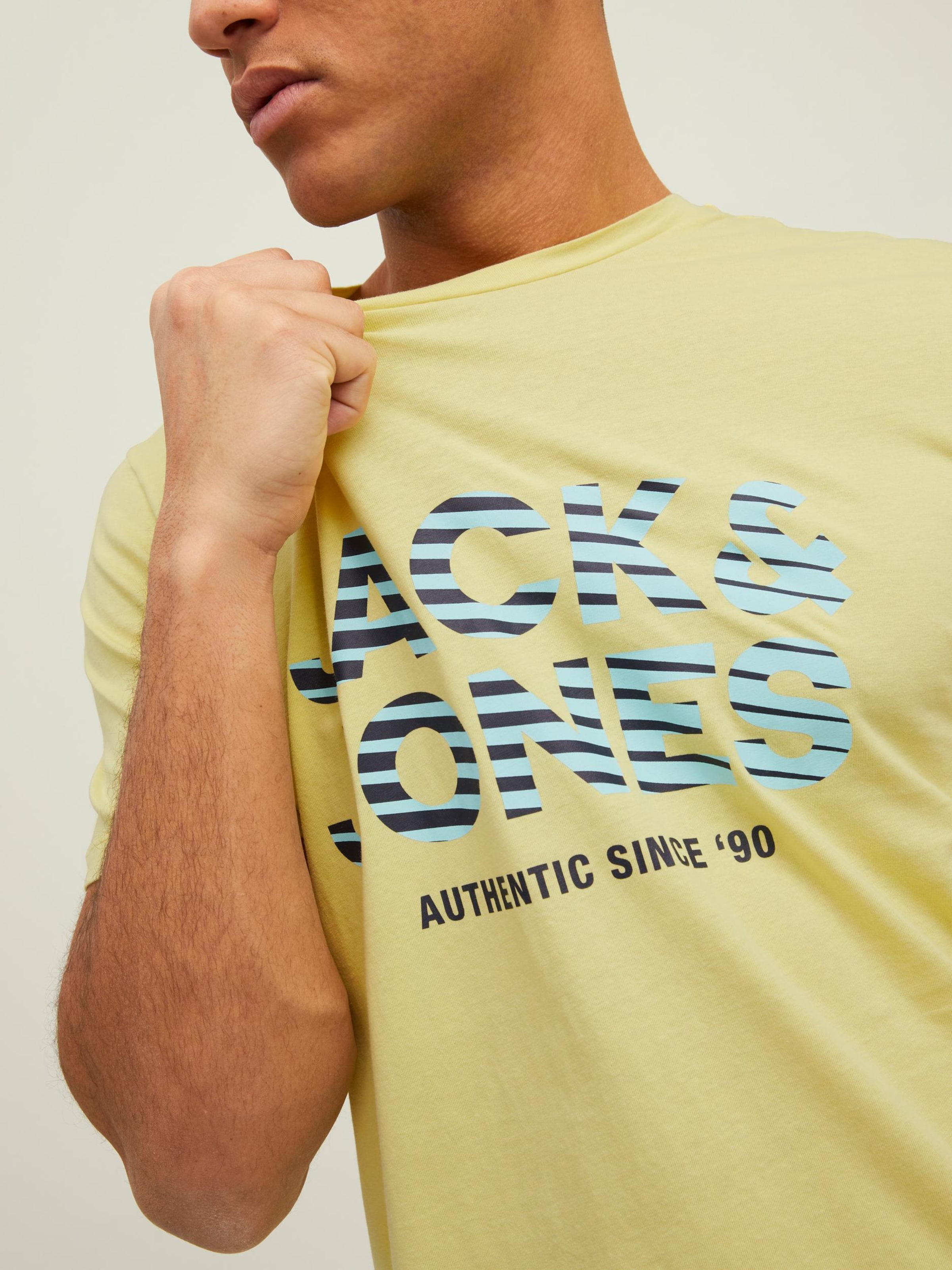 Männer Shirts JACK & JONES T-Shirt 'BOOSTER' in Pastellgelb - CI29716