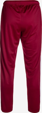 Loosefit Pantalon de sport 'DMWU Evolution' Unfair Athletics en rouge