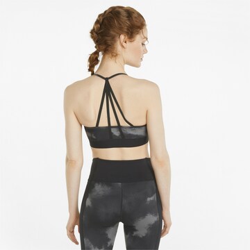 PUMA Bustier Sport-BH 'Risk Taker' in Schwarz