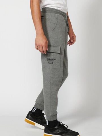 KOROSHI Tapered Cargohose in Grau