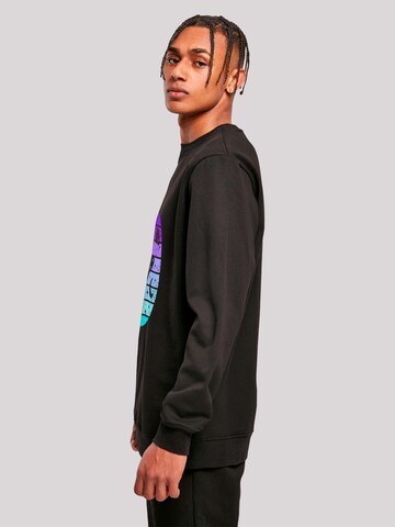 F4NT4STIC Sweatshirt 'Retro Alien Weltraum Sonnenuntergang' in Schwarz