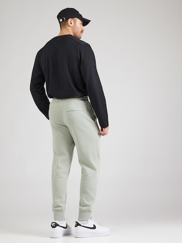 Nike Sportswear Tapered Byxa 'CLUB' i grön