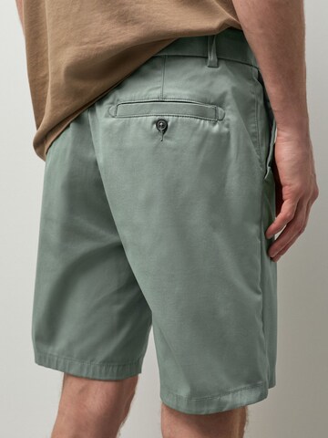 Slimfit Pantaloni chino di Next in verde