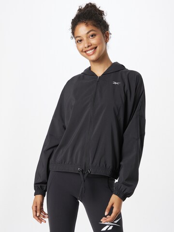 Reebok - Chaqueta deportiva en negro: frente