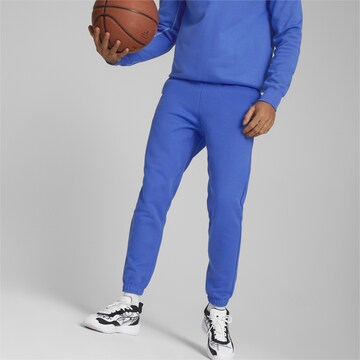 Regular Pantalon de sport 'Pivot EMB' PUMA en bleu : devant