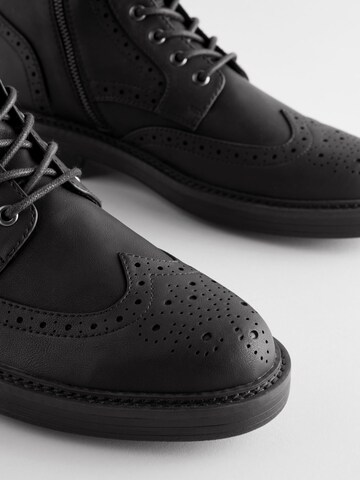 Boots stringati di Next in nero