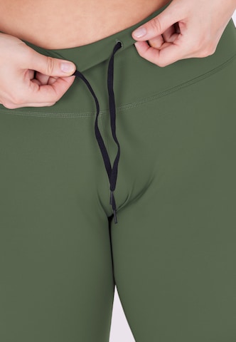 Q by Endurance Skinny Workout Pants 'Floriee' in Green