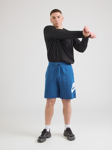 Nike Sportswear Широка кройка Панталон 'CLUB ALUMNI' в синьо