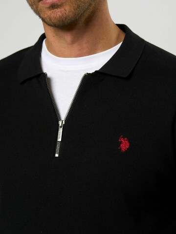 U.S. POLO ASSN. Neulepaita 'Rocky' värissä musta
