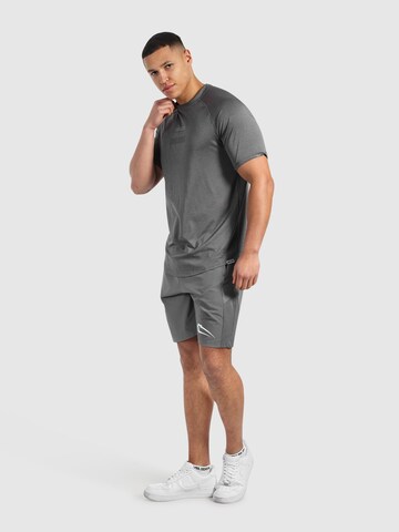 Regular Pantalon de sport ' Powerfit Triple ' Smilodox en gris