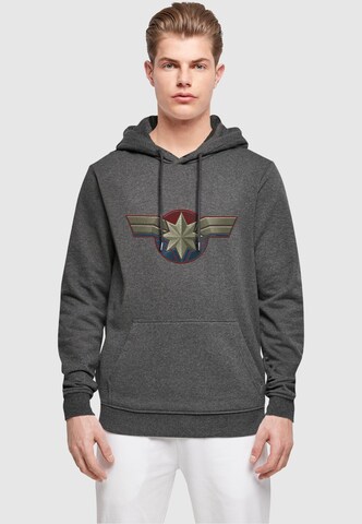 ABSOLUTE CULT Sweatshirt 'Captain Marvel - Chest Emblem' in Grijs: voorkant