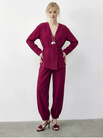 Completo pantalone di Bianco Lucci in rosa