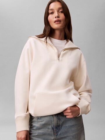 Sweat-shirt Calvin Klein en beige