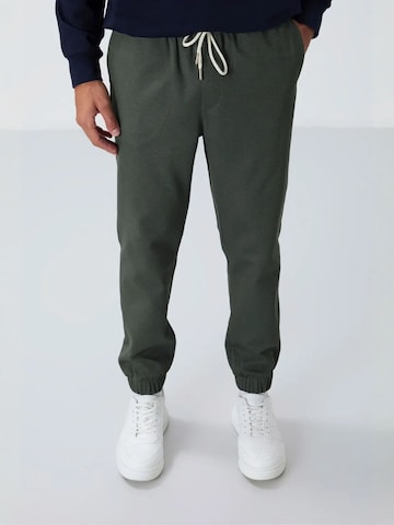 Pantaloni di Tommy Life in verde: frontale