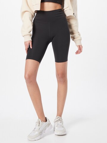 Girlfriend Collective Skinny Sportbroek in Zwart: voorkant