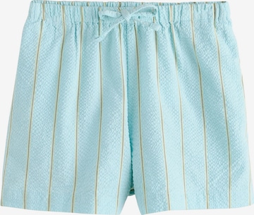 Next - Calças em azul: frente