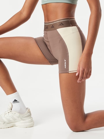 Skinny Pantaloni sportivi 'Techfit Colorblock' di ADIDAS PERFORMANCE in marrone