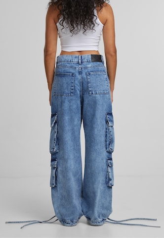 Loosefit Jeans cargo Pequs en bleu