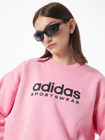 ADIDAS SPORTSWEAR Urheilullinen collegepaita 'All Szn Fleece Graphic' värissä vaaleanpunainen