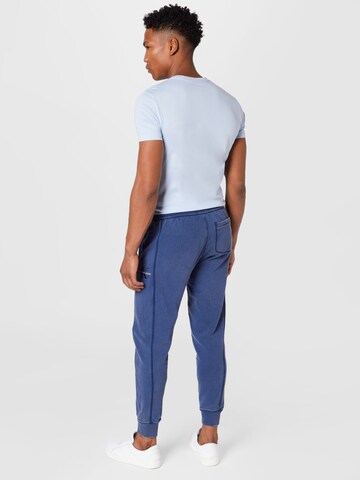 Calvin Klein Jeans Zúžený Kalhoty – modrá