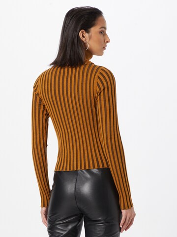 DKNY Sweter w kolorze brązowy