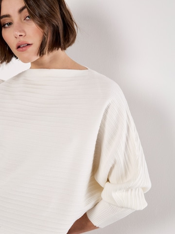 Pull-over ' ' Apricot en blanc