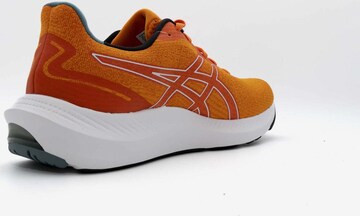 Chaussure de course ASICS en orange