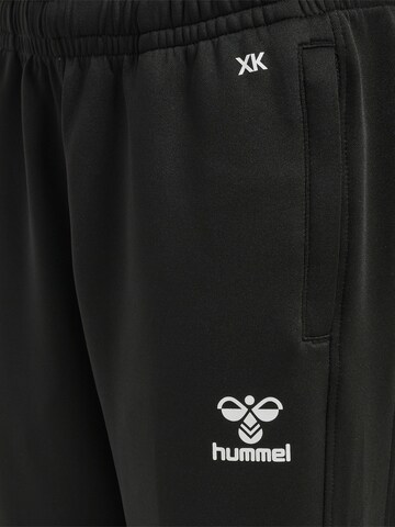 Hummel Slim fit Sports trousers in Black