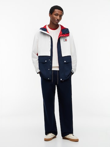 mėlyna Tommy Jeans Demisezoninė striukė