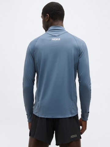 Tricou funcțional 'GLIDETECH' de la HOKA pe albastru