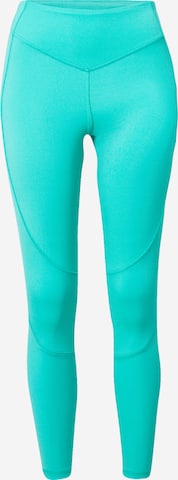 Reebok Skinny Workout Pants in Green: front