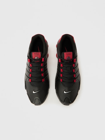 Nike Sportswear Matalavartiset tennarit 'Shox NZ' värissä musta