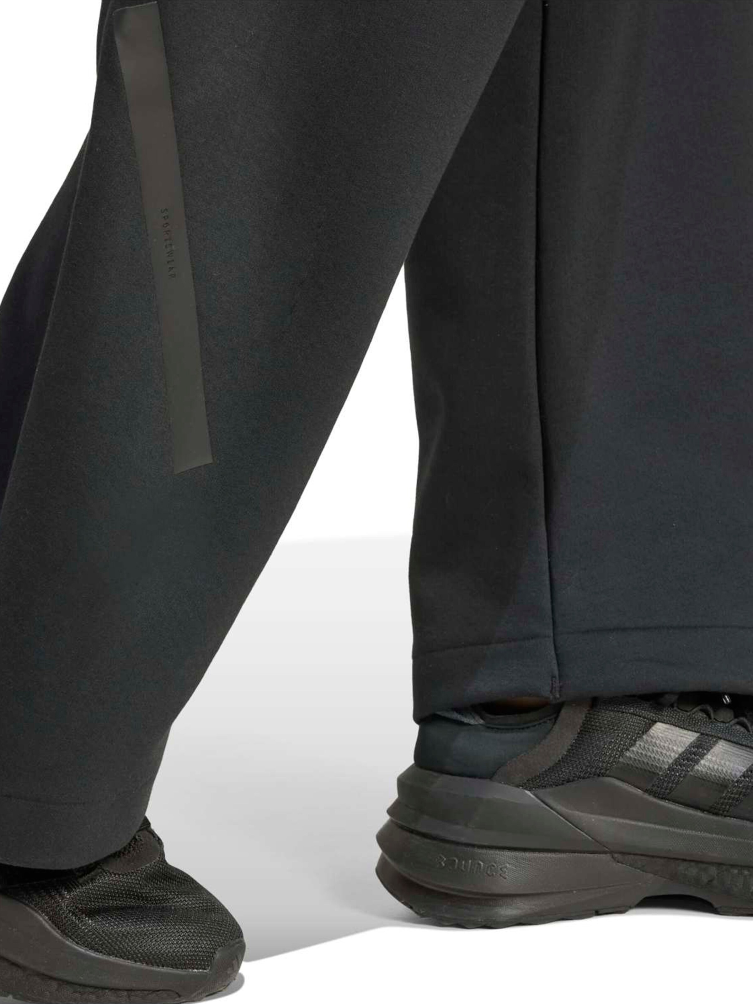 ADIDAS SPORTSWEAR Lużny krój Spodnie sportowe 'Z.N.E.' w kolorze czarny