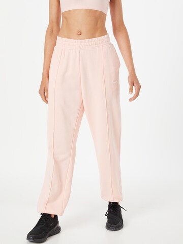Nike Sportswear Lużny krój Spodnie w kolorze różowy: przód
