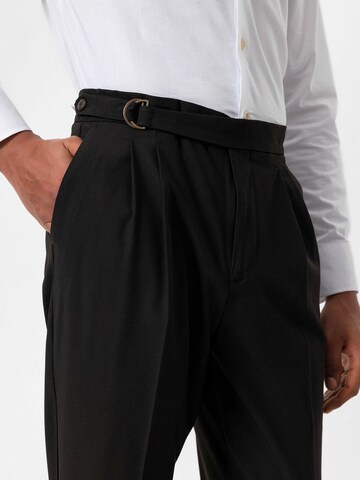 Antioch Tapered Pleat-Front Pants in Black