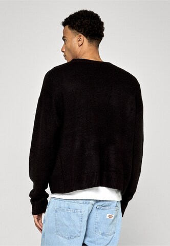 Vestes en maille Karl Kani en noir