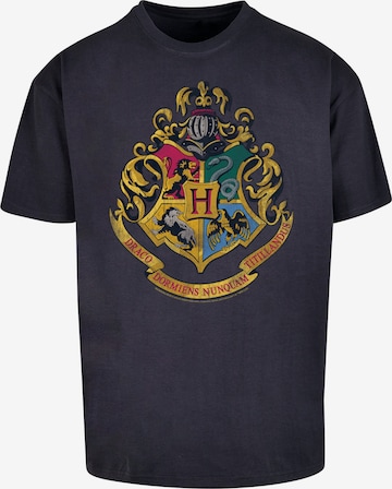 T-Shirt 'Harry Potter Distressed Hogwarts' F4NT4STIC en bleu : devant