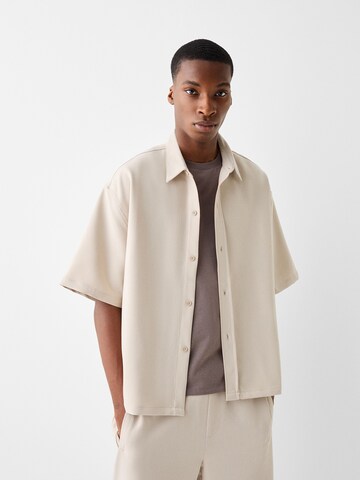 Bershka Loose fit Trousers in Beige