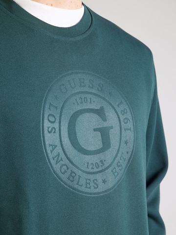 žalia GUESS Megztinis be užsegimo